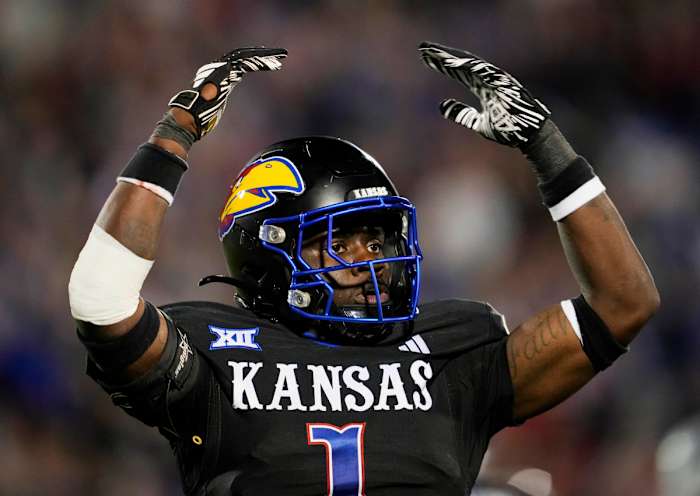 Kansas Jayhawks safety Kenny Logan Jr. (1) rallies the crowd.